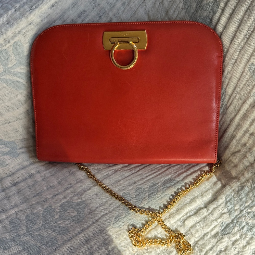 Salvatore Ferragamo coral Leather Clutch with Gold Accents
